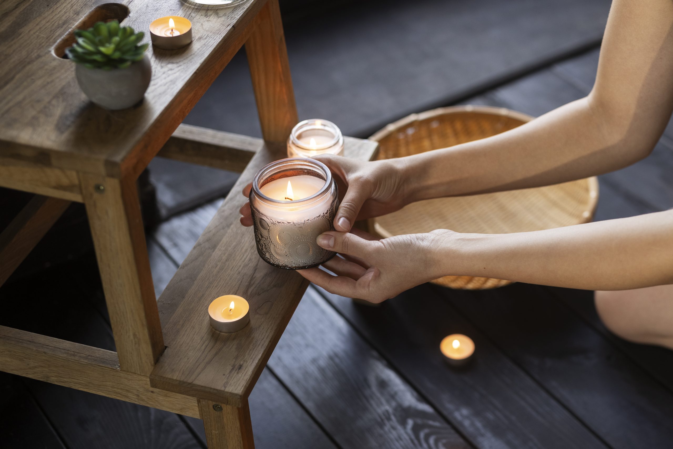 woman-holding-candle-high-angle